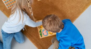 top-view-kids-playing-together_23-2149389942